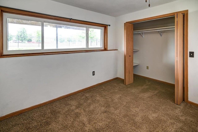 830 Violet Ln, Oregon, WI 53575 - unfurnished bedroom with carpet floors and a closet