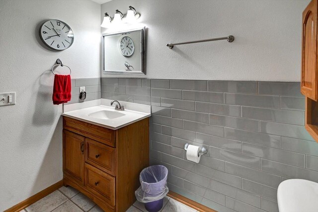 830 Violet Ln, Oregon, WI 53575 - bathroom with vanity and tile patterned floors