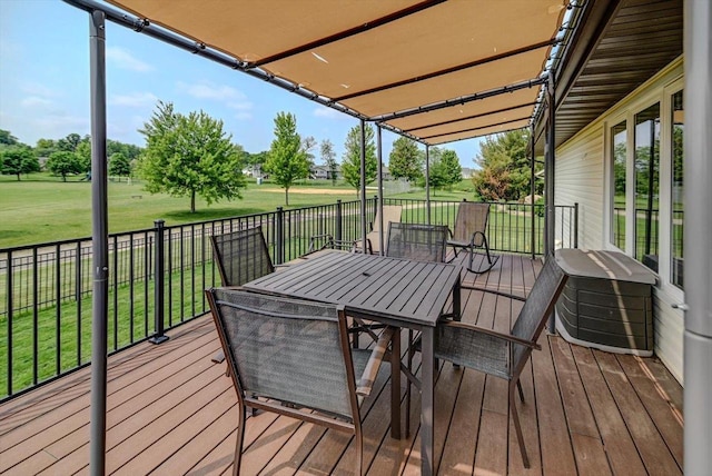 830 Violet Ln, Oregon, WI 53575 - deck featuring a yard and outdoor dining area