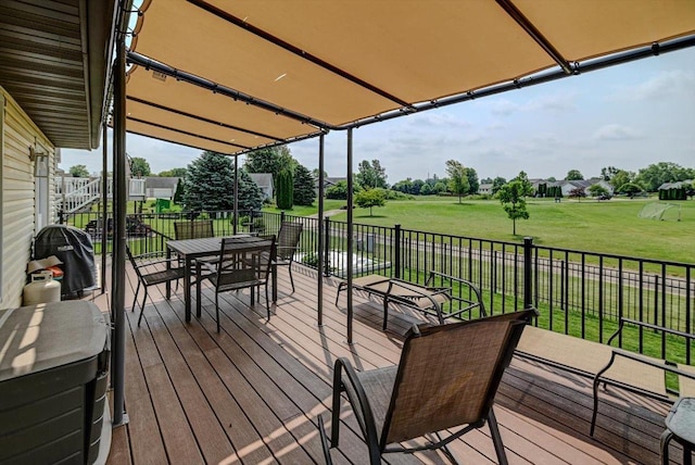 830 Violet Ln, Oregon, WI 53575 - deck featuring outdoor dining area, a lawn, and golf course view