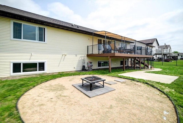 830 Violet Ln, Oregon, WI 53575 - rear view of house featuring an outdoor fire pit, a patio, stairs, a deck, and a yard