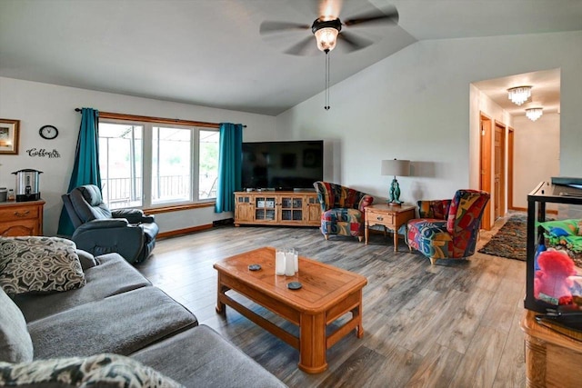 830 Violet Ln, Oregon, WI 53575 - living room with lofted ceiling, a ceiling fan, and wood finished floors