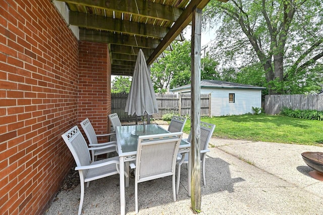 2517 Ashland Ave, Racine, WI 53403 - fenced backyard with outdoor dining area and a patio area
