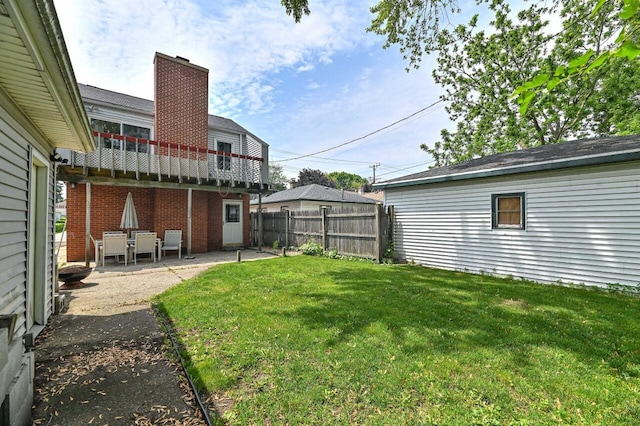 2517 Ashland Ave, Racine, WI 53403 - view of yard featuring a patio and a balcony