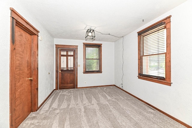 2517 Ashland Ave, Racine, WI 53403 - foyer featuring carpet floors and baseboards