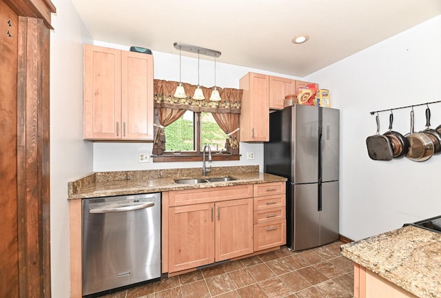 2517 Ashland Ave, Racine, WI 53403 - kitchen featuring appliances with stainless steel finishes, light brown cabinetry, light stone countertops, and recessed lighting