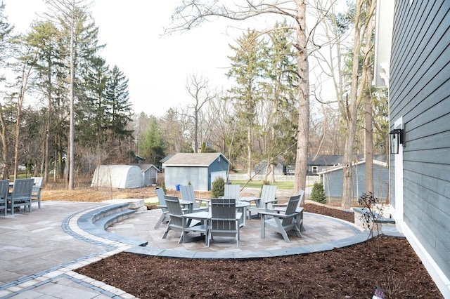 545 Wisconsin Ave, Delafield, WI 53018 - view of patio with outdoor dining area and a shed