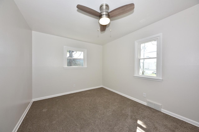 4821 N 58th St, Milwaukee, WI 53218 - spare room with carpet floors and a ceiling fan