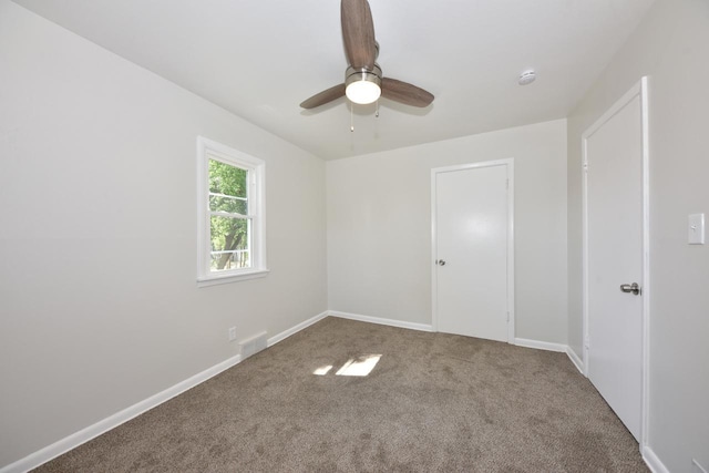 4821 N 58th St, Milwaukee, WI 53218 - carpeted empty room featuring ceiling fan and a smoke detector