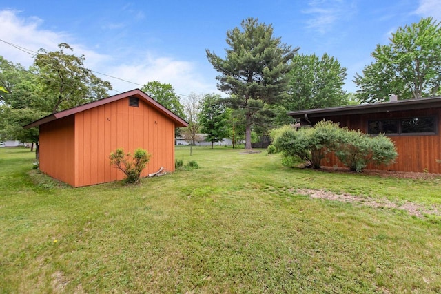 24 Hazelwood Dr, Stevens Point, WI 54481 - view of grassy yard with an outdoor structure