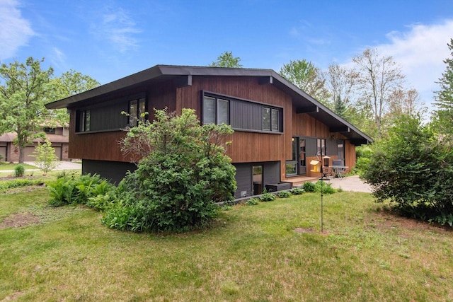 24 Hazelwood Dr, Stevens Point, WI 54481 - rear view of property with a lawn and cooling unit