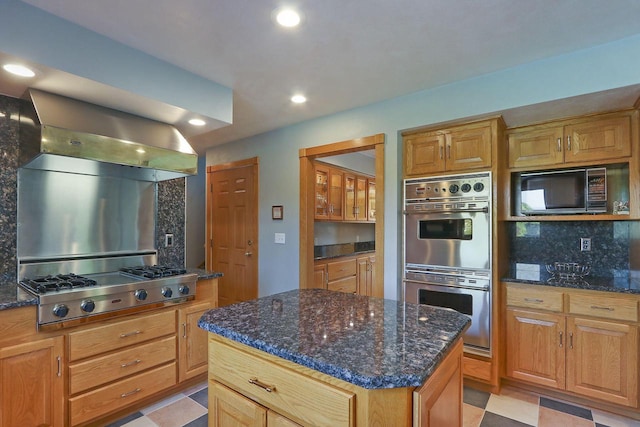1434 43rd Ave, Kenosha, WI 53144 - kitchen with stainless steel appliances, exhaust hood, backsplash, dark stone counters, and recessed lighting