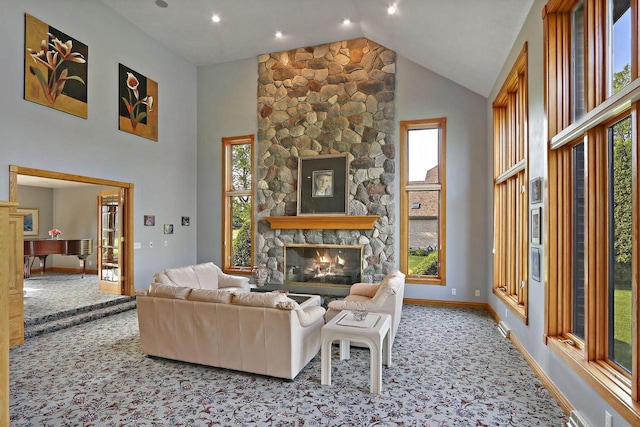 1434 43rd Ave, Kenosha, WI 53144 - carpeted living area featuring healthy amount of natural light, a fireplace, and high vaulted ceiling