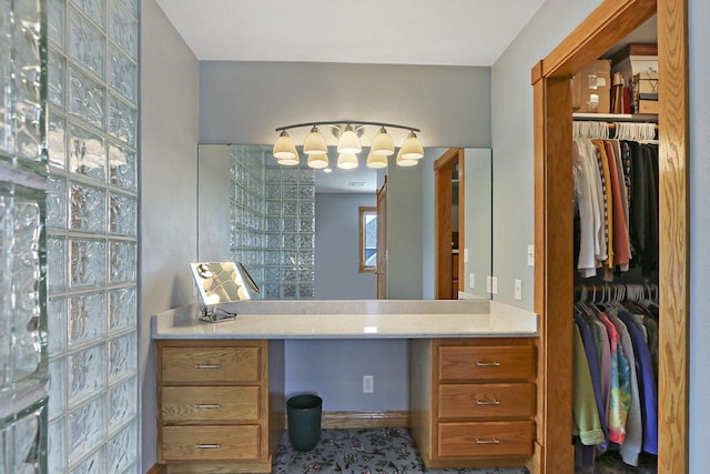 1434 43rd Ave, Kenosha, WI 53144 - bathroom featuring vanity and a walk in closet