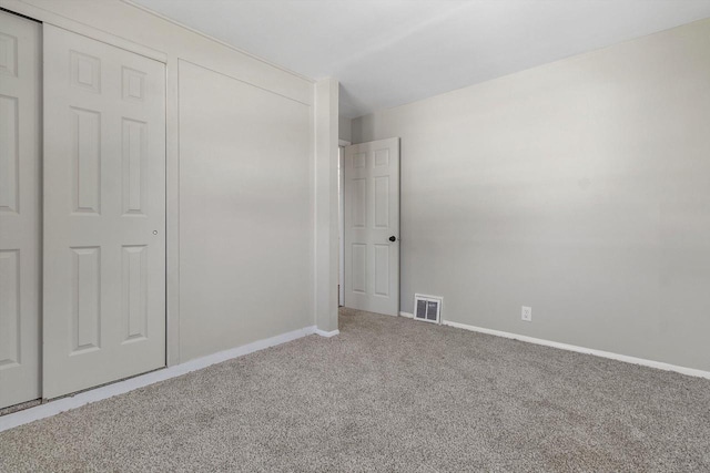 1933 Jay Eye See Ave, Racine, WI 53403 - unfurnished bedroom featuring carpet flooring and a closet