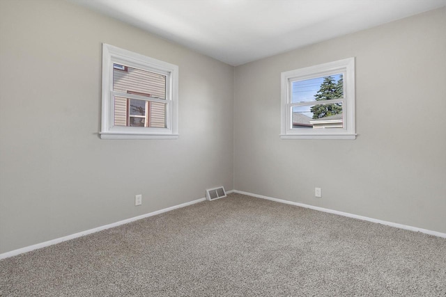 1933 Jay Eye See Ave, Racine, WI 53403 - empty room with carpet flooring and baseboards