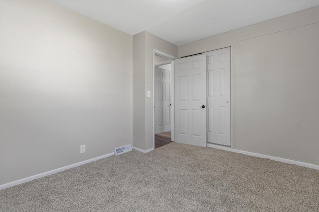 1933 Jay Eye See Ave, Racine, WI 53403 - unfurnished bedroom featuring carpet flooring and a closet