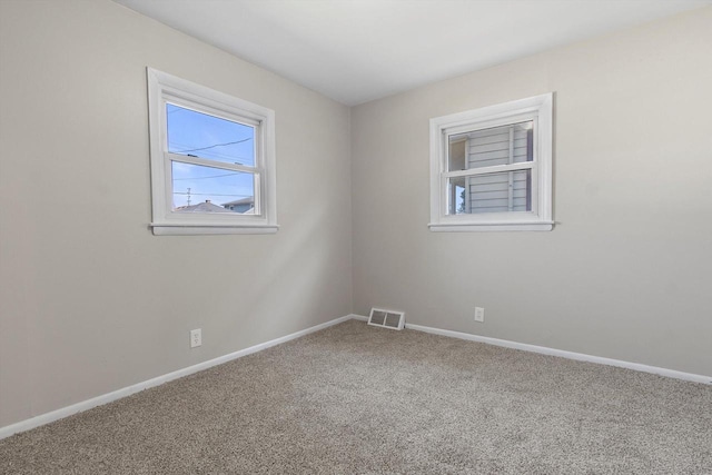 1933 Jay Eye See Ave, Racine, WI 53403 - unfurnished room with carpet flooring and baseboards