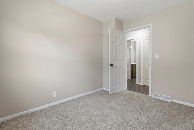 1933 Jay Eye See Ave, Racine, WI 53403 - empty room featuring carpet and baseboards