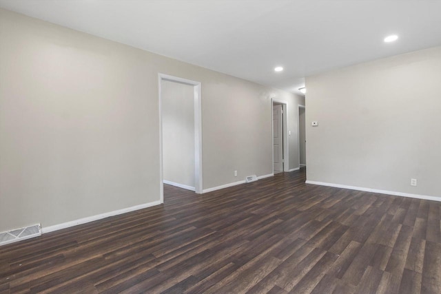 1933 Jay Eye See Ave, Racine, WI 53403 - empty room with recessed lighting and dark wood finished floors