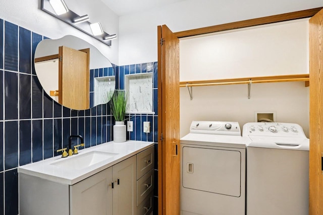 33A Grand Canyon Dr Unit 110, Baraboo, WI 53913 - washroom with washing machine and clothes dryer and tile walls