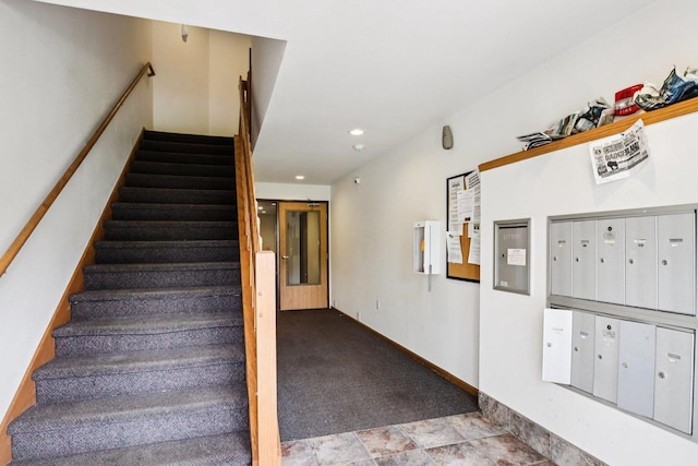 33A Grand Canyon Dr Unit 110, Baraboo, WI 53913 - stairway featuring mail area, recessed lighting, elevator, and carpet flooring