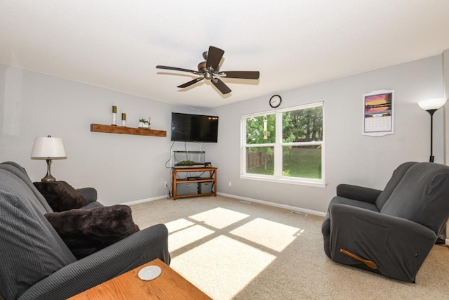 1557 Serena Ln, Burlington, WI 53105 - living area featuring carpet floors and a ceiling fan