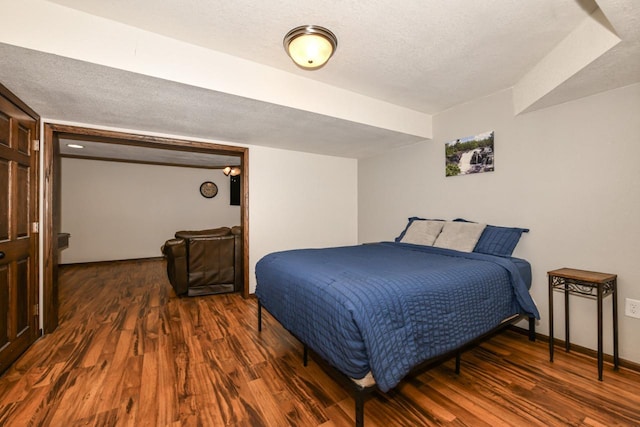1557 Serena Ln, Burlington, WI 53105 - bedroom featuring wood finished floors and a textured ceiling