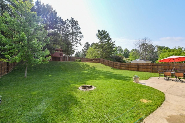 1557 Serena Ln, Burlington, WI 53105 - fenced backyard featuring a patio area