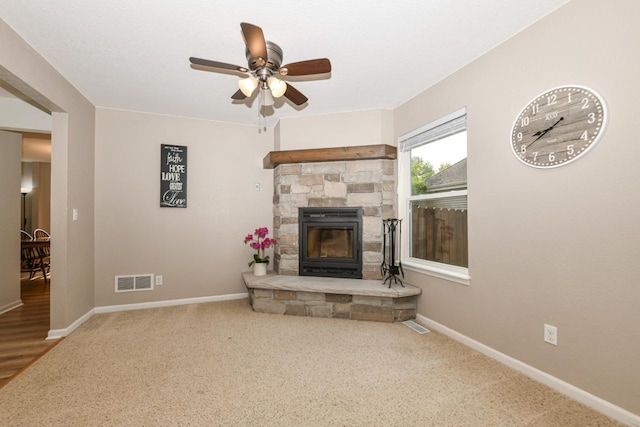 1557 Serena Ln, Burlington, WI 53105 - unfurnished living room with a ceiling fan, a fireplace, and carpet