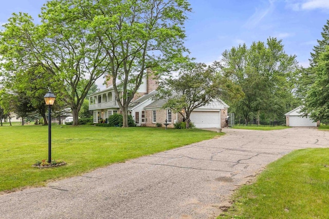 544 Maple Bluff Rd, Stevens Point, WI 54482 - view of front facade with a front yard, an attached garage, and brick siding