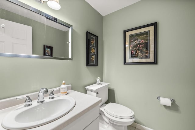 544 Maple Bluff Rd, Stevens Point, WI 54482 - half bathroom featuring toilet and vanity