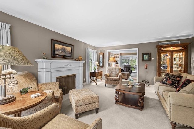 544 Maple Bluff Rd, Stevens Point, WI 54482 - carpeted living room featuring ornamental molding and a high end fireplace