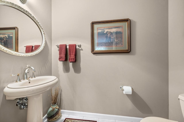 544 Maple Bluff Rd, Stevens Point, WI 54482 - bathroom featuring toilet and tile patterned flooring