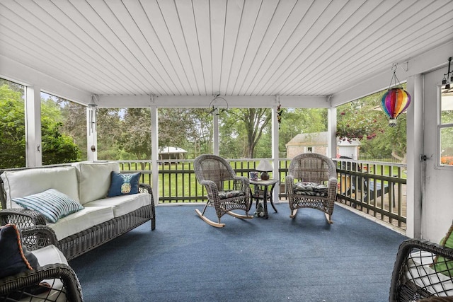 544 Maple Bluff Rd, Stevens Point, WI 54482 - sunroom / solarium with an outdoor hangout area and view of wooded area