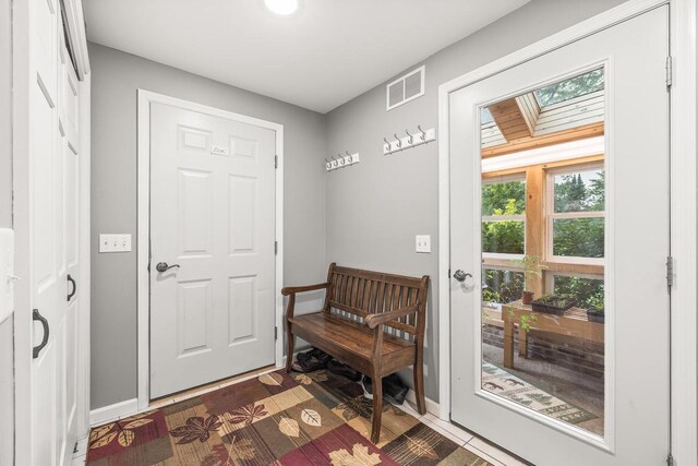 544 Maple Bluff Rd, Stevens Point, WI 54482 - entryway with a skylight and baseboards