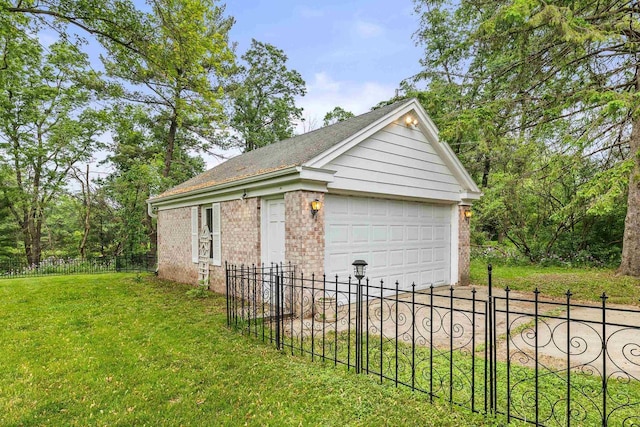 544 Maple Bluff Rd, Stevens Point, WI 54482 - view of property exterior featuring a detached garage, brick siding, and an outdoor structure