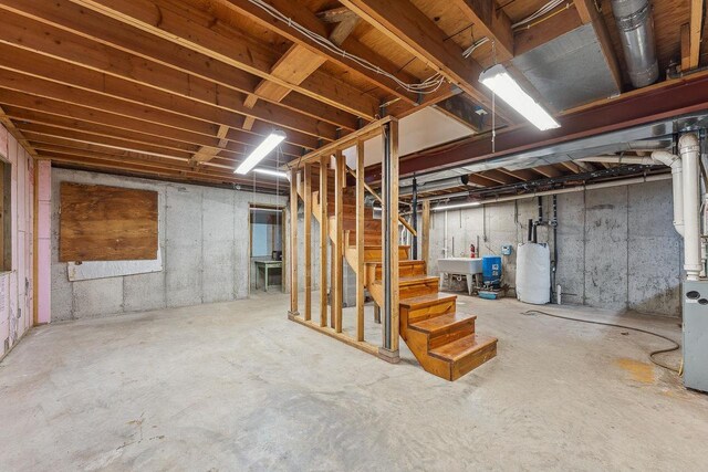 N3045 Lakeview Dr, Montello, WI 53949 - unfinished below grade area featuring stairs and a sink
