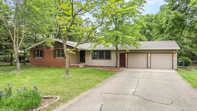535 Maple Bluff Rd, Stevens Point, WI 54482 - single story home with a garage, asphalt driveway, and a front yard