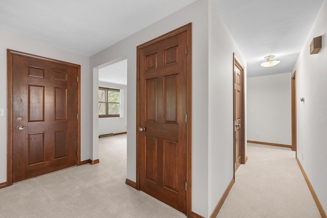 535 Maple Bluff Rd, Stevens Point, WI 54482 - corridor featuring light colored carpet and baseboards