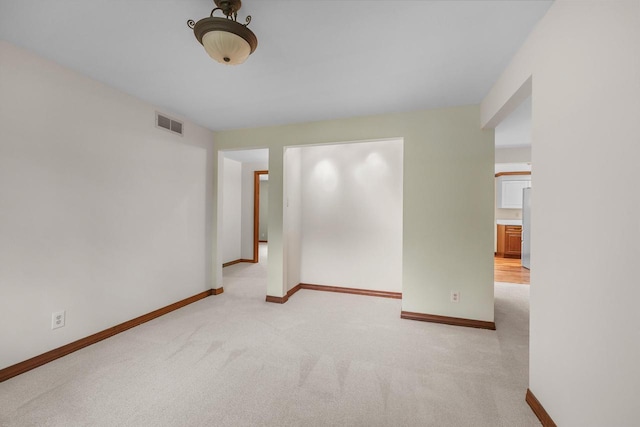 535 Maple Bluff Rd, Stevens Point, WI 54482 - spare room with light carpet and baseboards