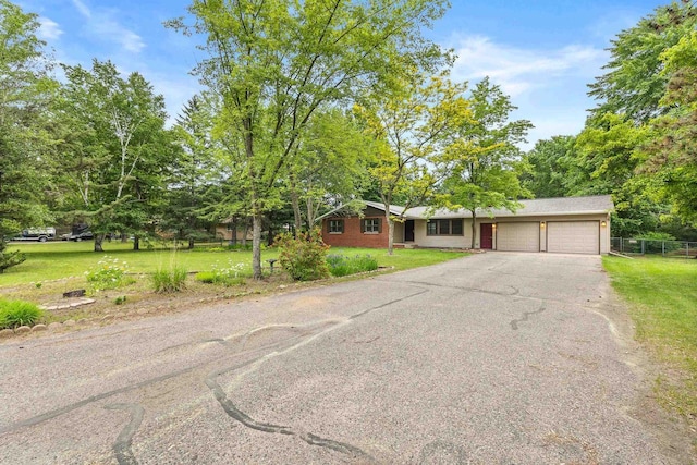 535 Maple Bluff Rd, Stevens Point, WI 54482 - view of front of house with an attached garage and driveway
