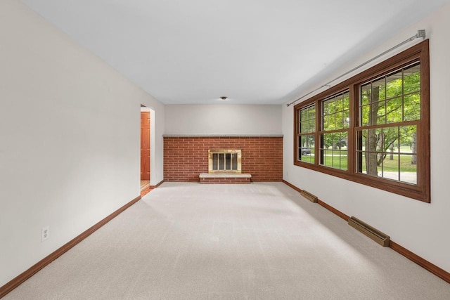 535 Maple Bluff Rd, Stevens Point, WI 54482 - unfurnished living room featuring a fireplace and carpet