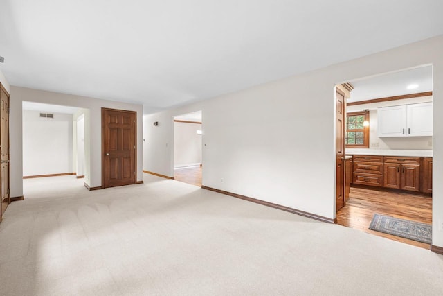 535 Maple Bluff Rd, Stevens Point, WI 54482 - empty room with light carpet and baseboards