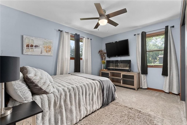 1516 Mitscher Ave, Eau Claire, WI 54701 - carpeted bedroom featuring a ceiling fan and baseboards