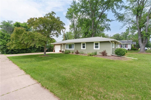 1516 Mitscher Ave, Eau Claire, WI 54701 - single story home with a garage, concrete driveway, and a front lawn