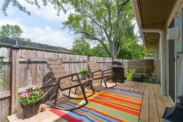 1516 Mitscher Ave, Eau Claire, WI 54701 - deck with a fenced backyard and a grill