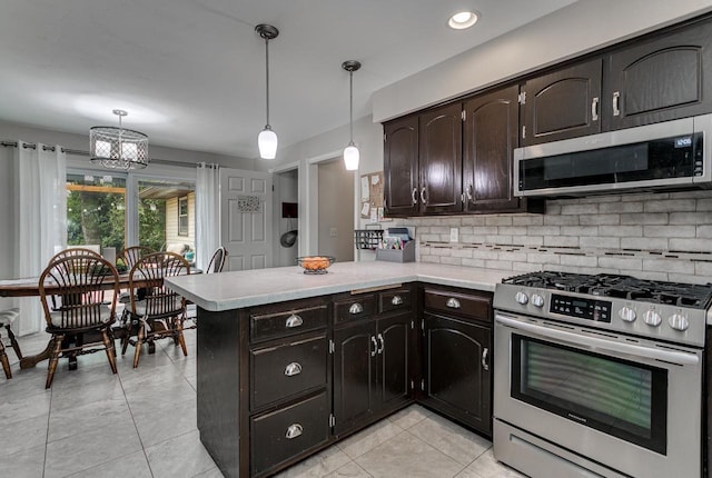 1801 N Mc Intosh Dr, Appleton, WI 54914 - kitchen with stainless steel appliances, light countertops, backsplash, light tile patterned flooring, and recessed lighting