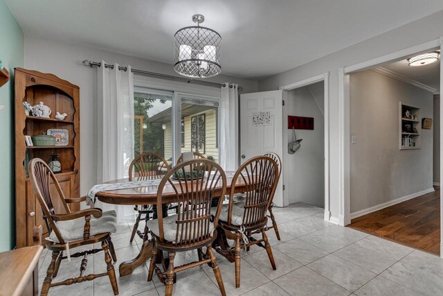 1801 N Mc Intosh Dr, Appleton, WI 54914 - dining area featuring a chandelier and light tile patterned floors