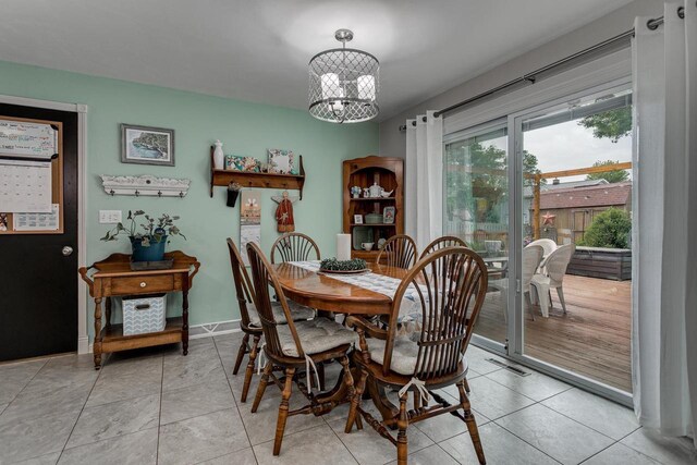 1801 N Mc Intosh Dr, Appleton, WI 54914 - dining room with a chandelier and light tile patterned floors